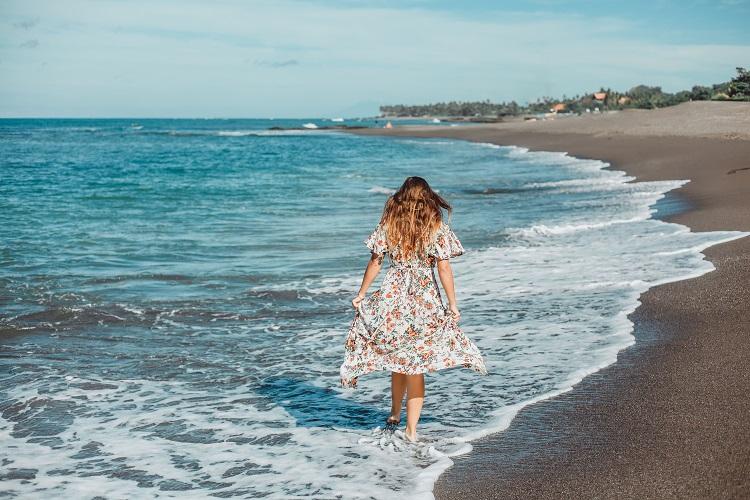 young-beautiful-girl-posing-on-the-beach-ocean-waves-bright-sun-and-tanned-skin.jpg