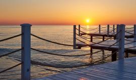 wooden-pier-fancy-orange-sunset_146671-18820.jpg
