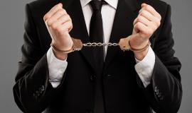 businessman-with-manacles-his-hands_144627-3844.jpg