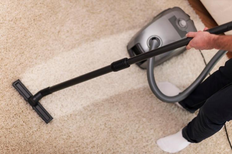 close-up-vacuuming-carpet_329181-636.jpg