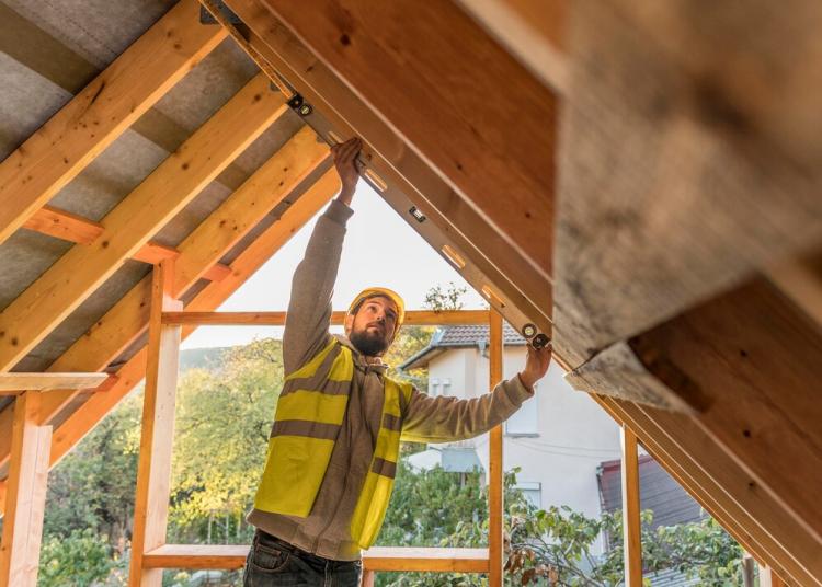 carpenter-man-working-roof_23-2148748788.jpg