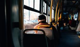 interior-of-a-city-bus-with-yellow-holding-rails.jpg