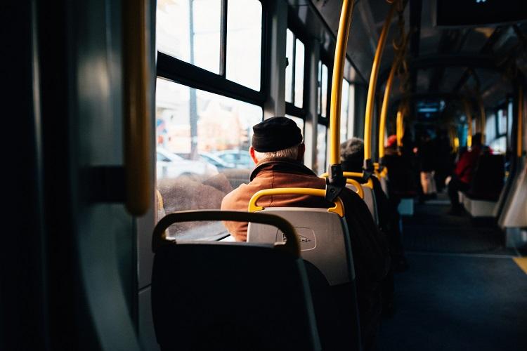 interior-of-a-city-bus-with-yellow-holding-rails.jpg