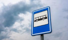 low-angle-shot-bus-stop-sign_181624-32465.jpg