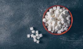 white-sugar-cubes-bowl-dark-textured-background-top-view-space-text_176474-1710.jpg