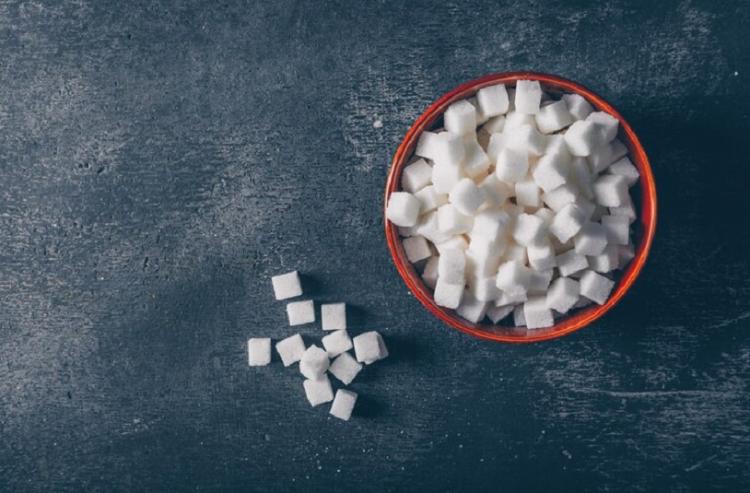 white-sugar-cubes-bowl-dark-textured-background-top-view-space-text_176474-1710.jpg