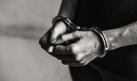 criminal-in-handcuffs (2).jpg