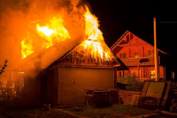 wooden-barn-burning-night-high-orange-fire-flames-dense-smoke-from-tiled-roof-dark-sky-trees-silhouettes-residential-wooden-neighbor-cottage-background-disaster-danger-concept_127089-4239.jpg