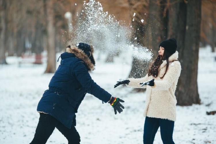 young-man-throwing-snowball-his-friend_1153-1419.jpg