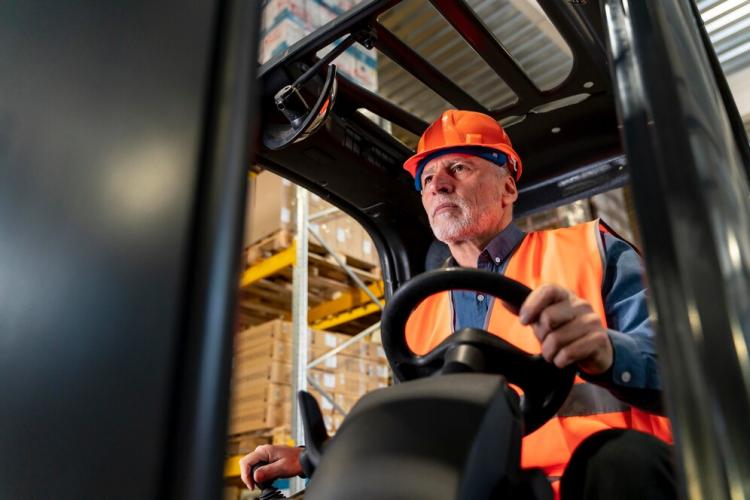 man-driving-warehouse-loading-machine_23-2148923134.jpg