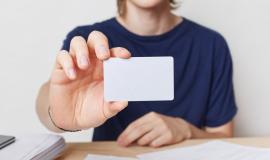 cropped-shot-young-male-hands-holds-blank-card-with-copy-space-your-text-advertising-content_176532-9388.jpg