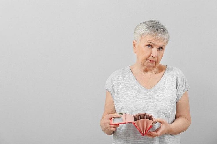 senior-woman-with-empty-wallet-on-light-background_392895-36207-transformed.jpeg